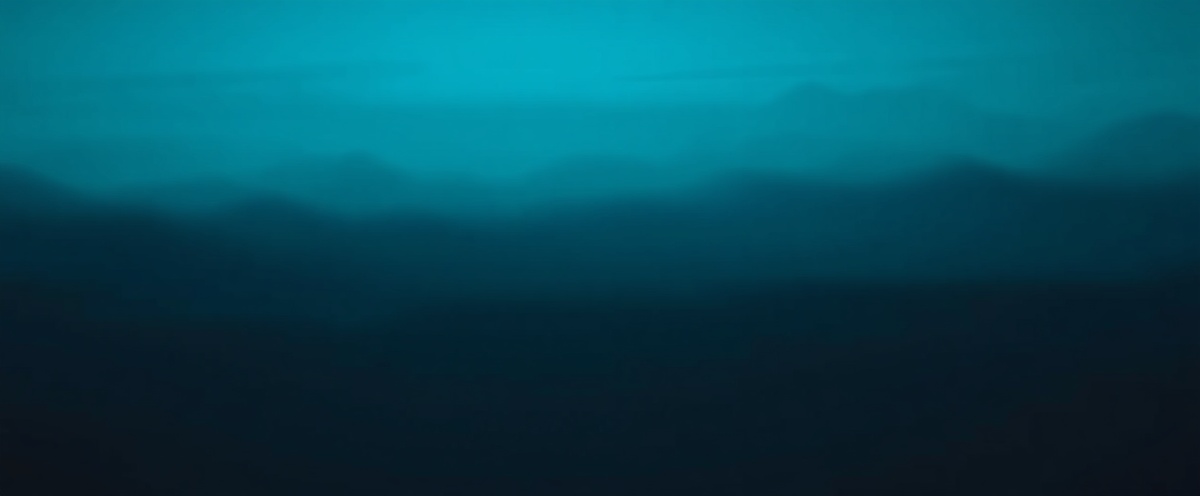 Dense coastal fog over ocean at dusk